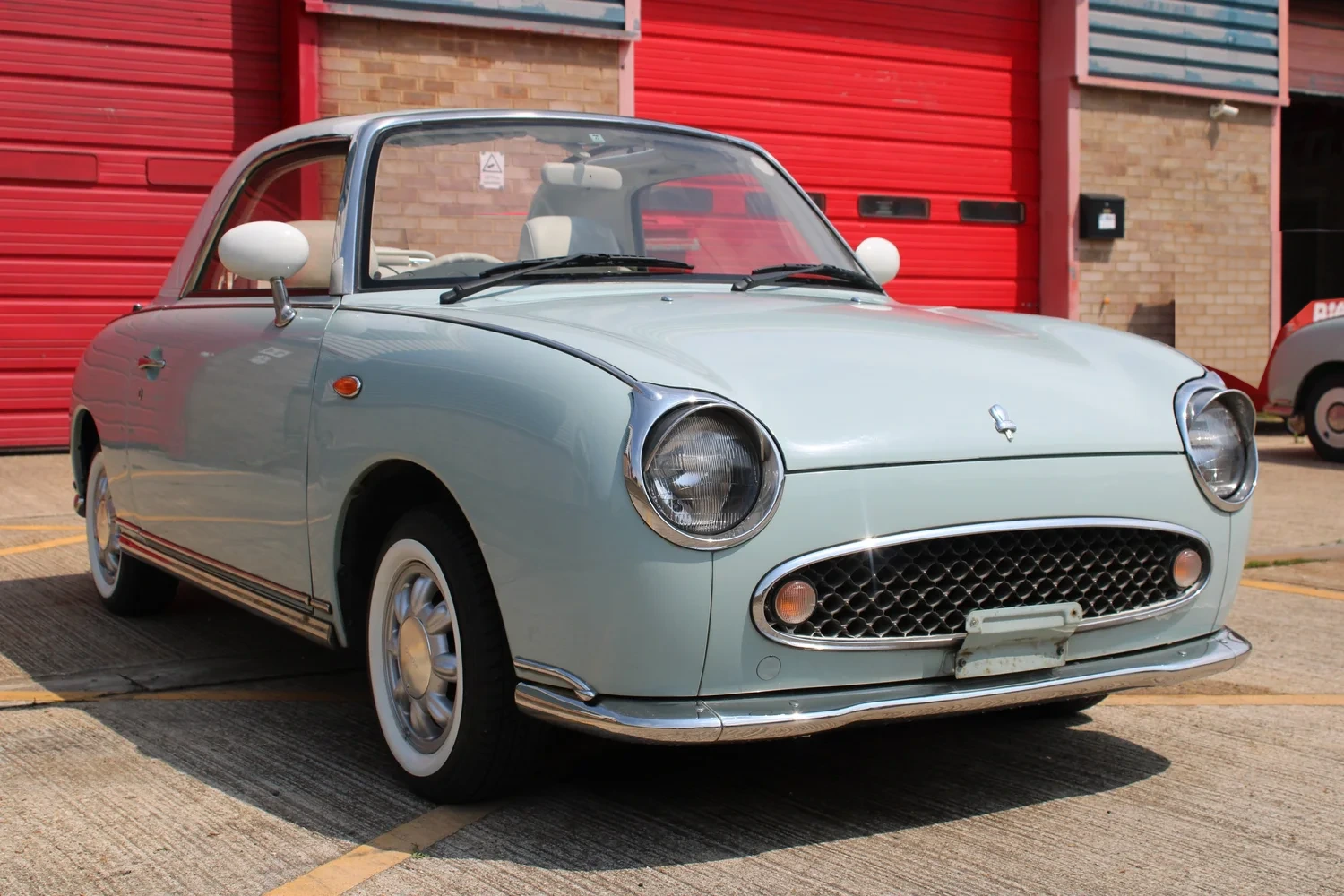 Pale Aqua Nissan Figaro – 72,000 miles